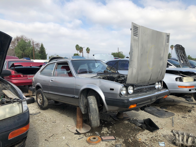 Illustration for article titled These Wrecking Yard Cars Are Breaking My Heart